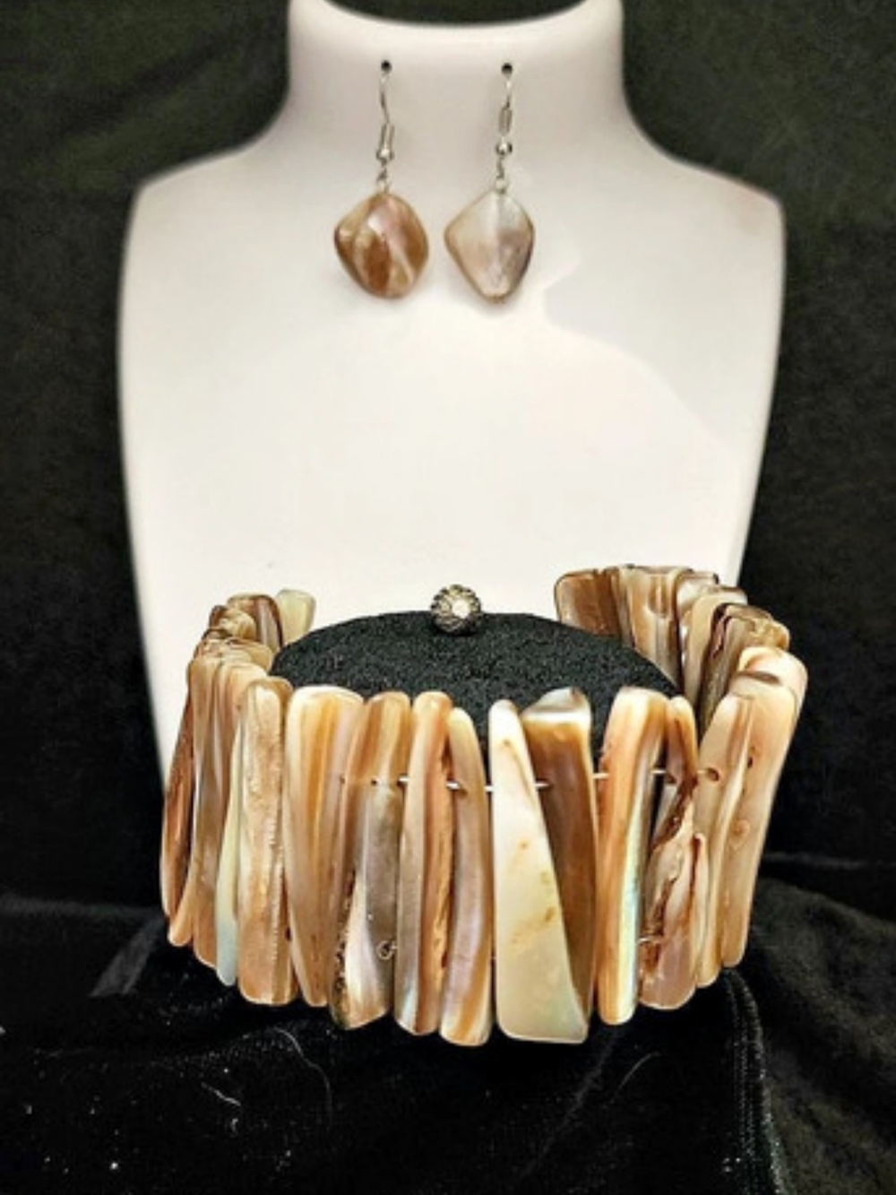 Mother of pearl set: bracelet 8-9.5 inch, earrings 1.5 inch.